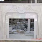 White marble fireplace mantel